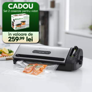 aparat de vidat foodsaver ffs017x pe masa cu fileuri de somon in punga